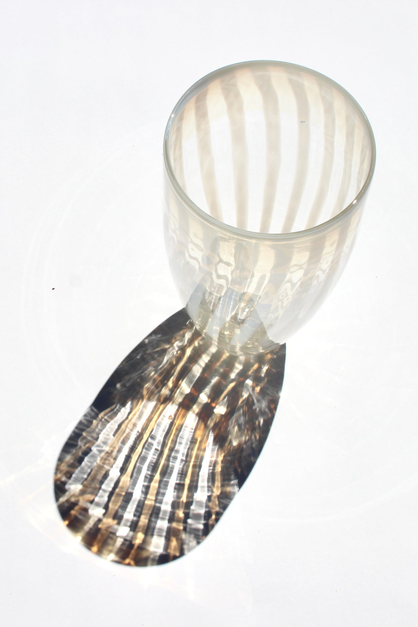 white-striped glass vase
