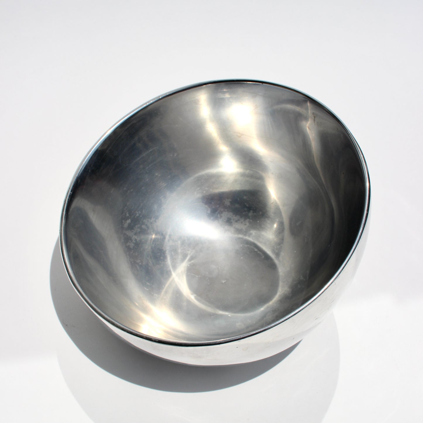 tilt metal bowl
