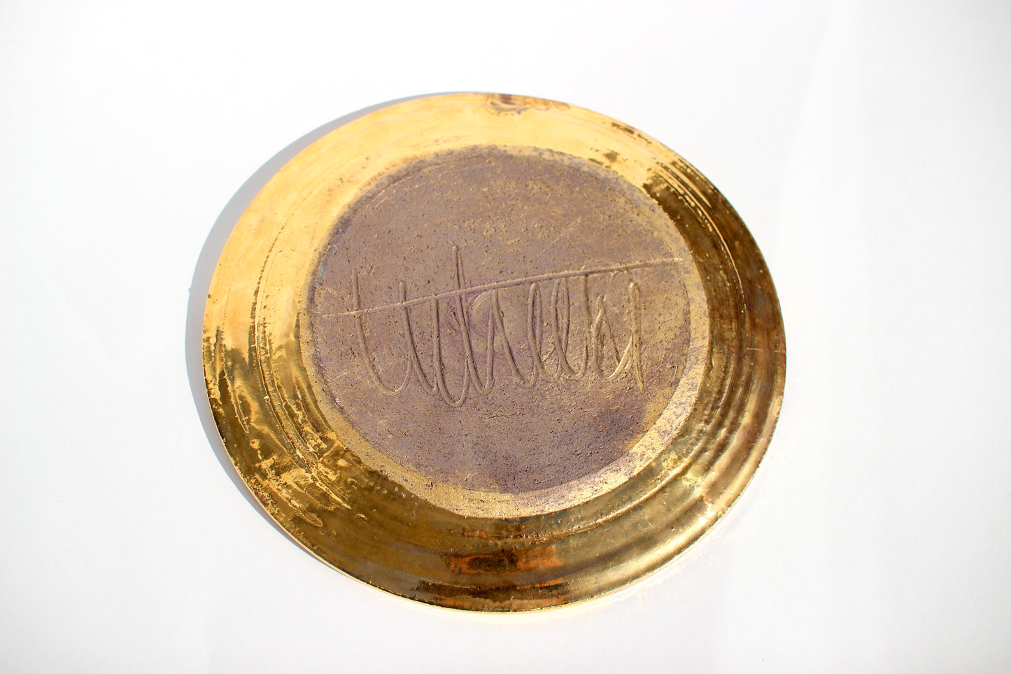 handmade metallic pottery plate