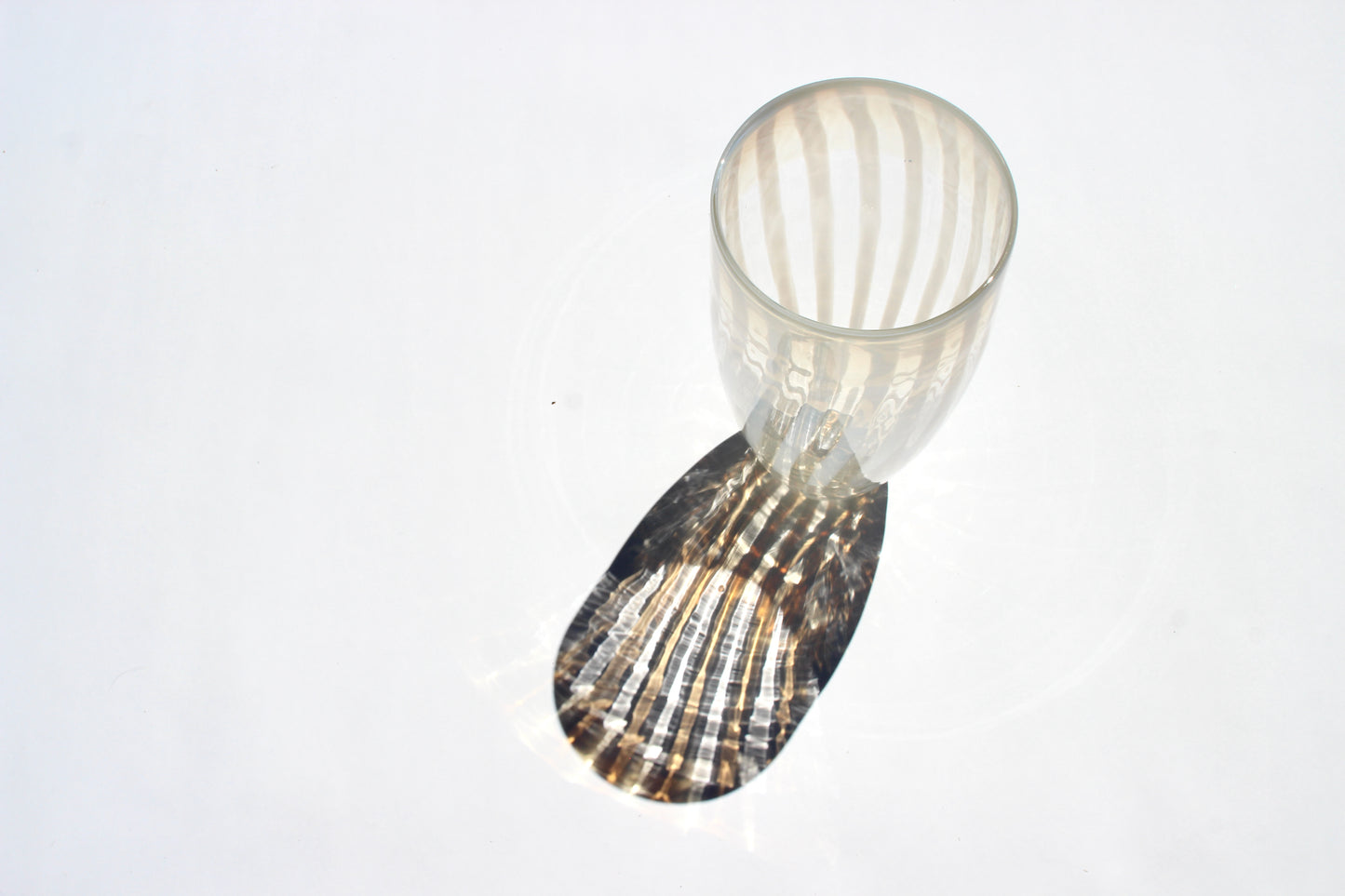 white-striped glass vase