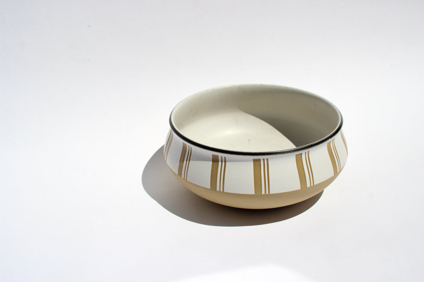 tan + cream stoneware bowl