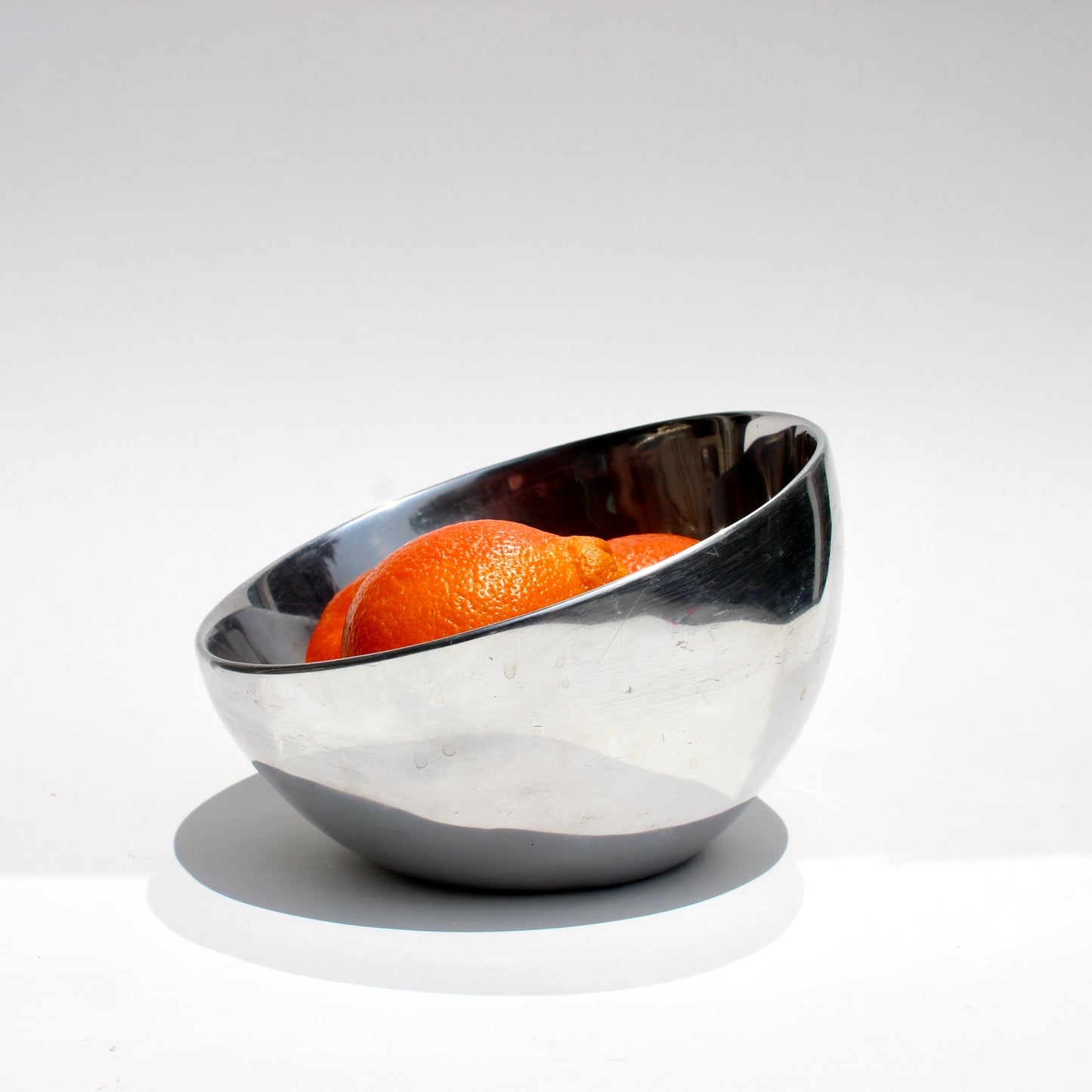 tilt metal bowl