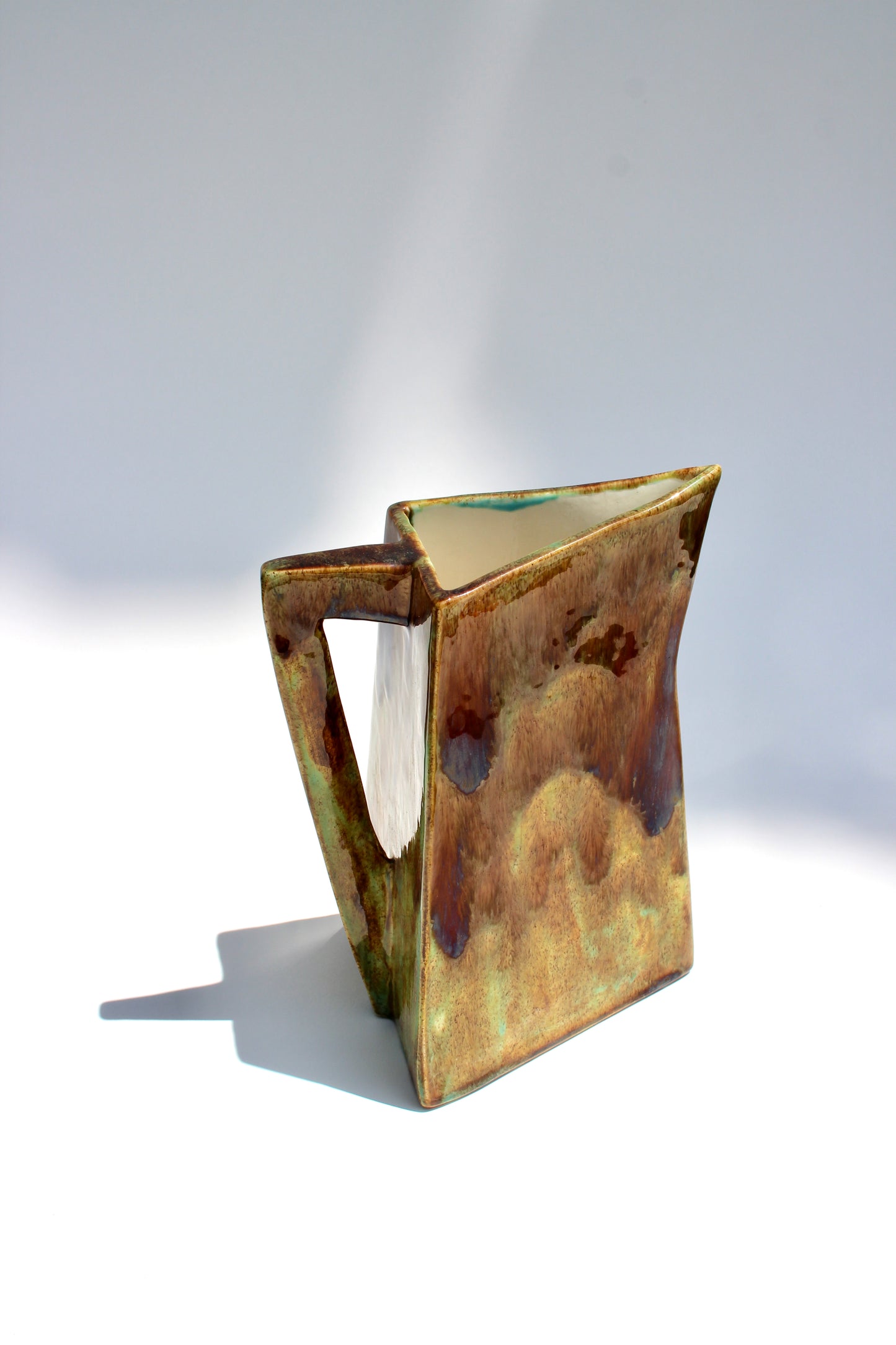 handmade triangle ceramic pitcher