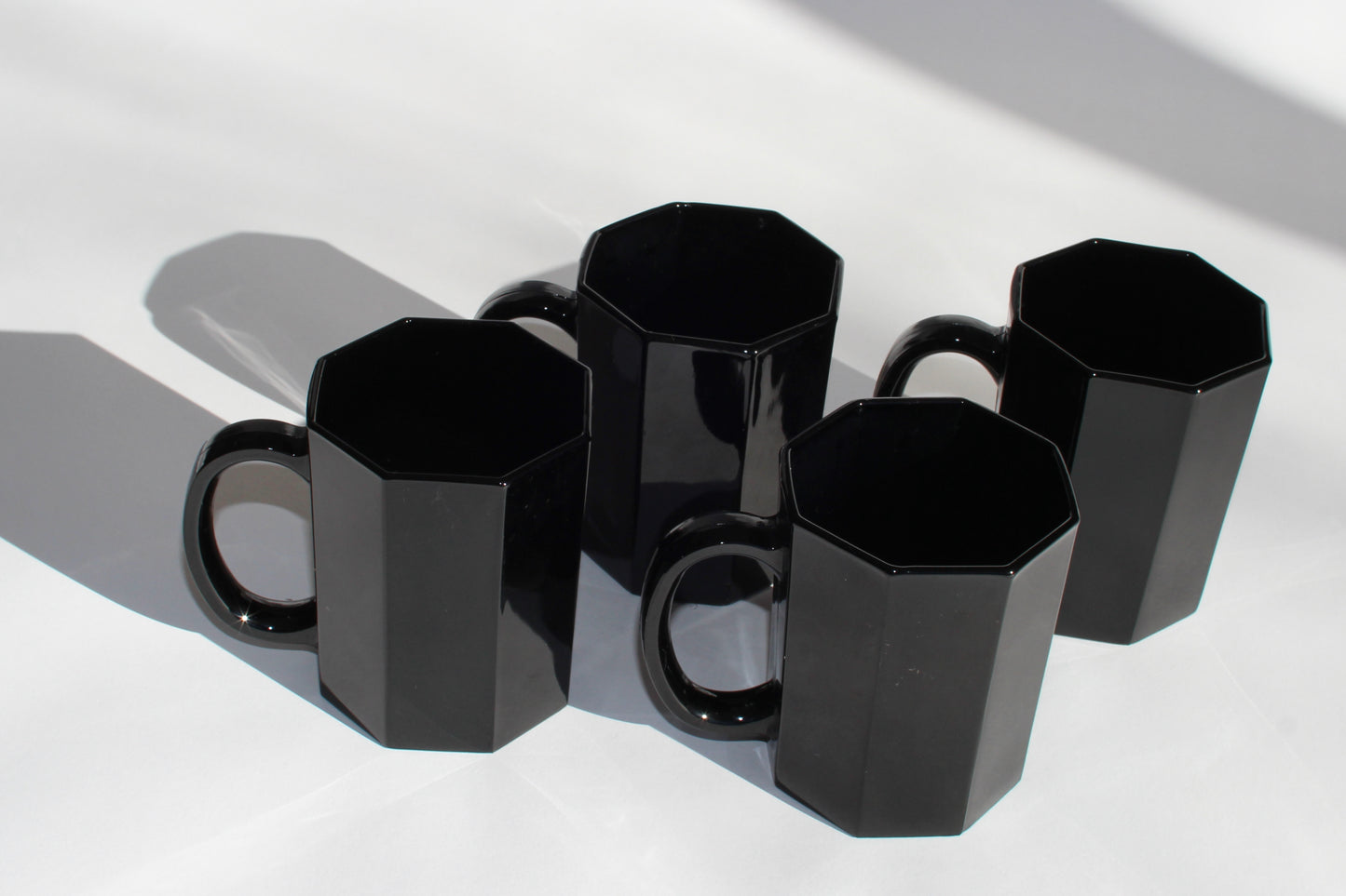 black octo coffee mugs (2)