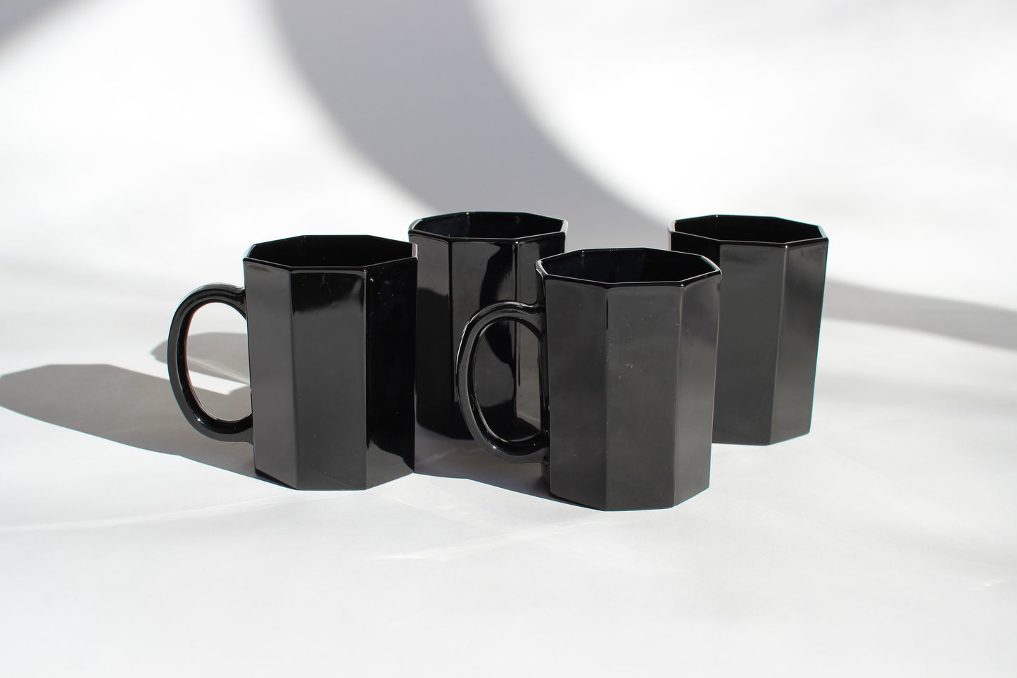 black octo coffee mugs (2)