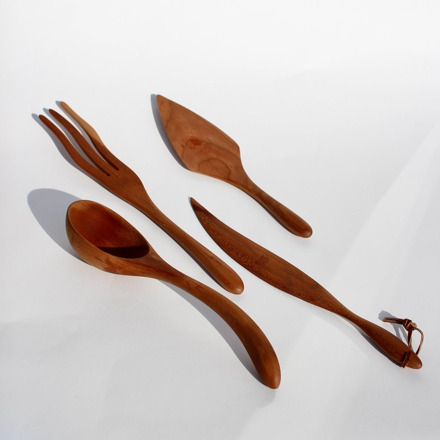 carved wooden utensils (each)