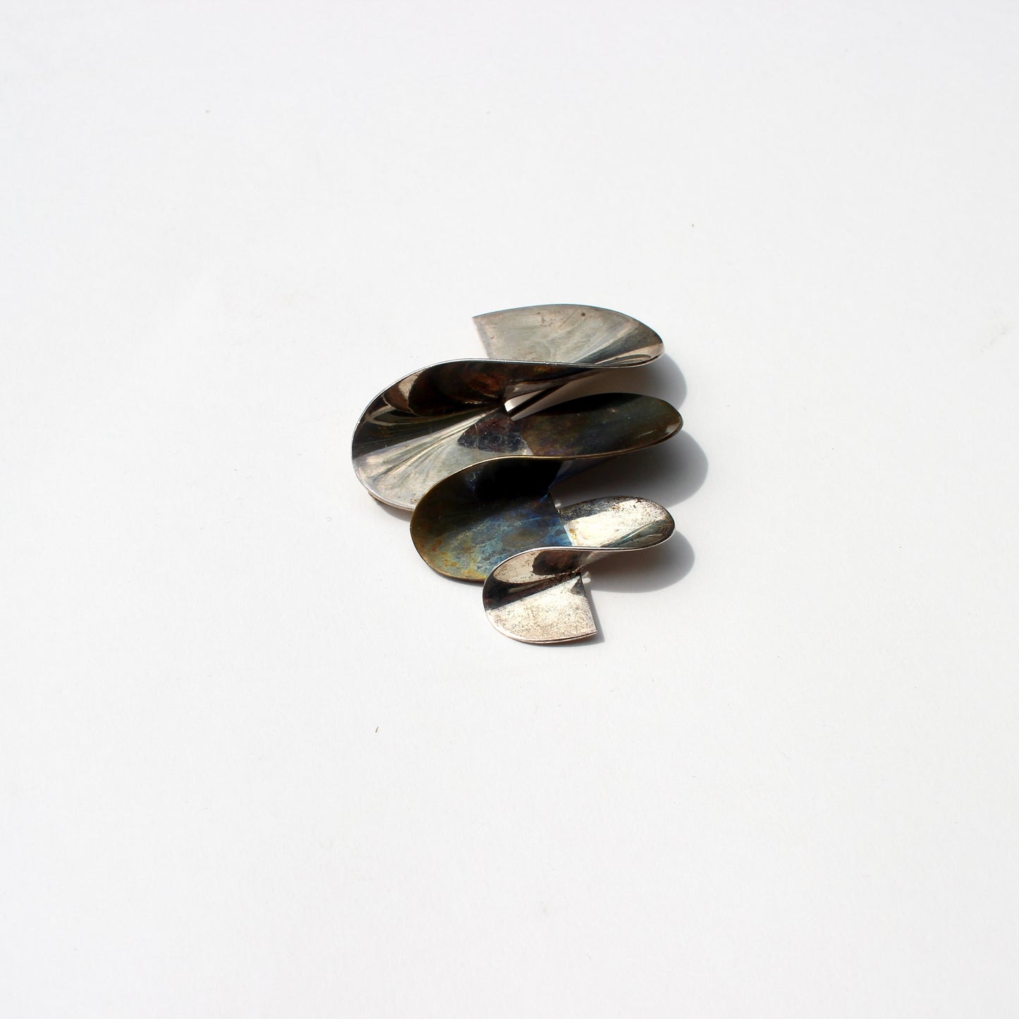 modernist silver + brass brooch