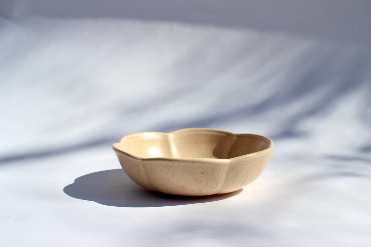 peach scalloped ceramic bowl