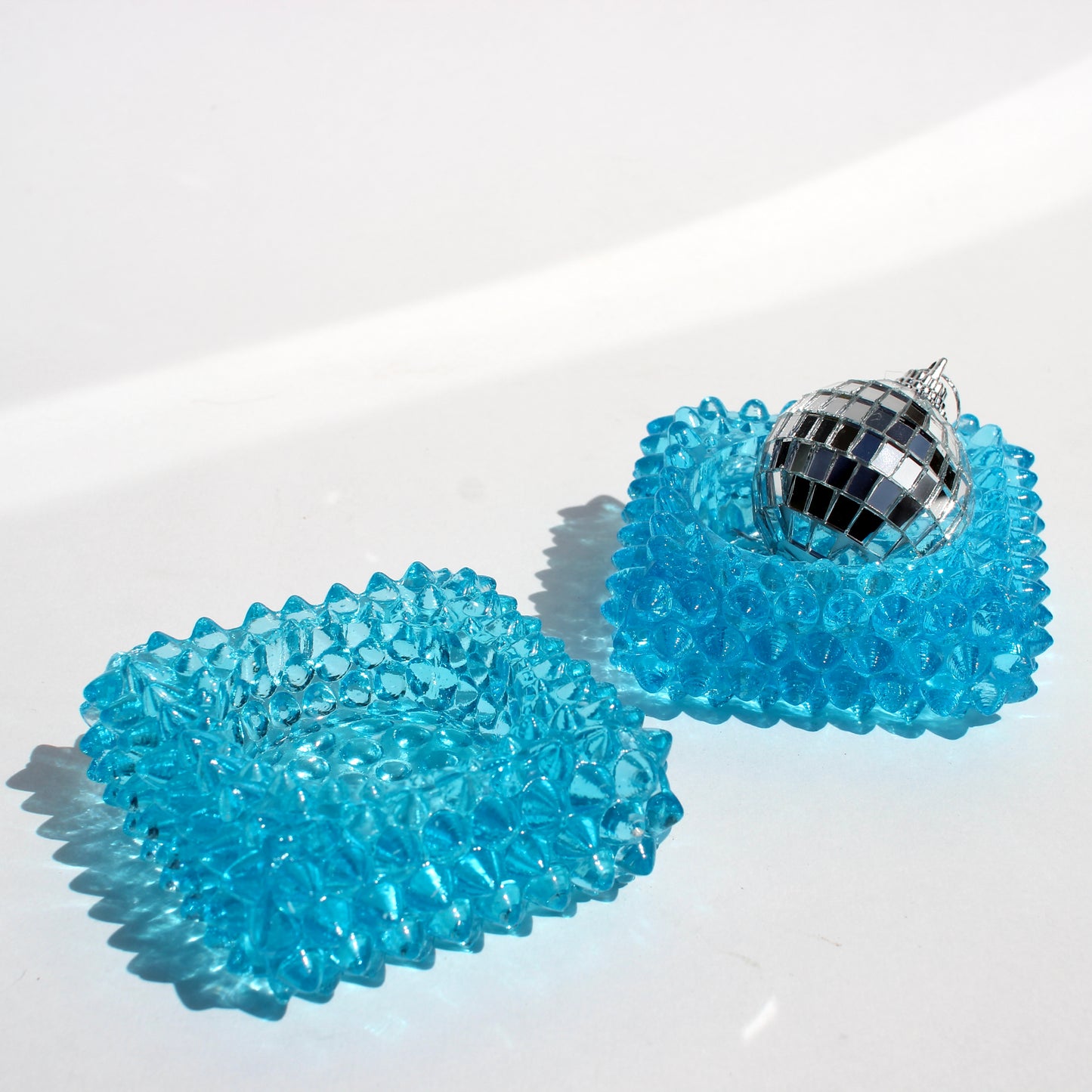 studded ring holders