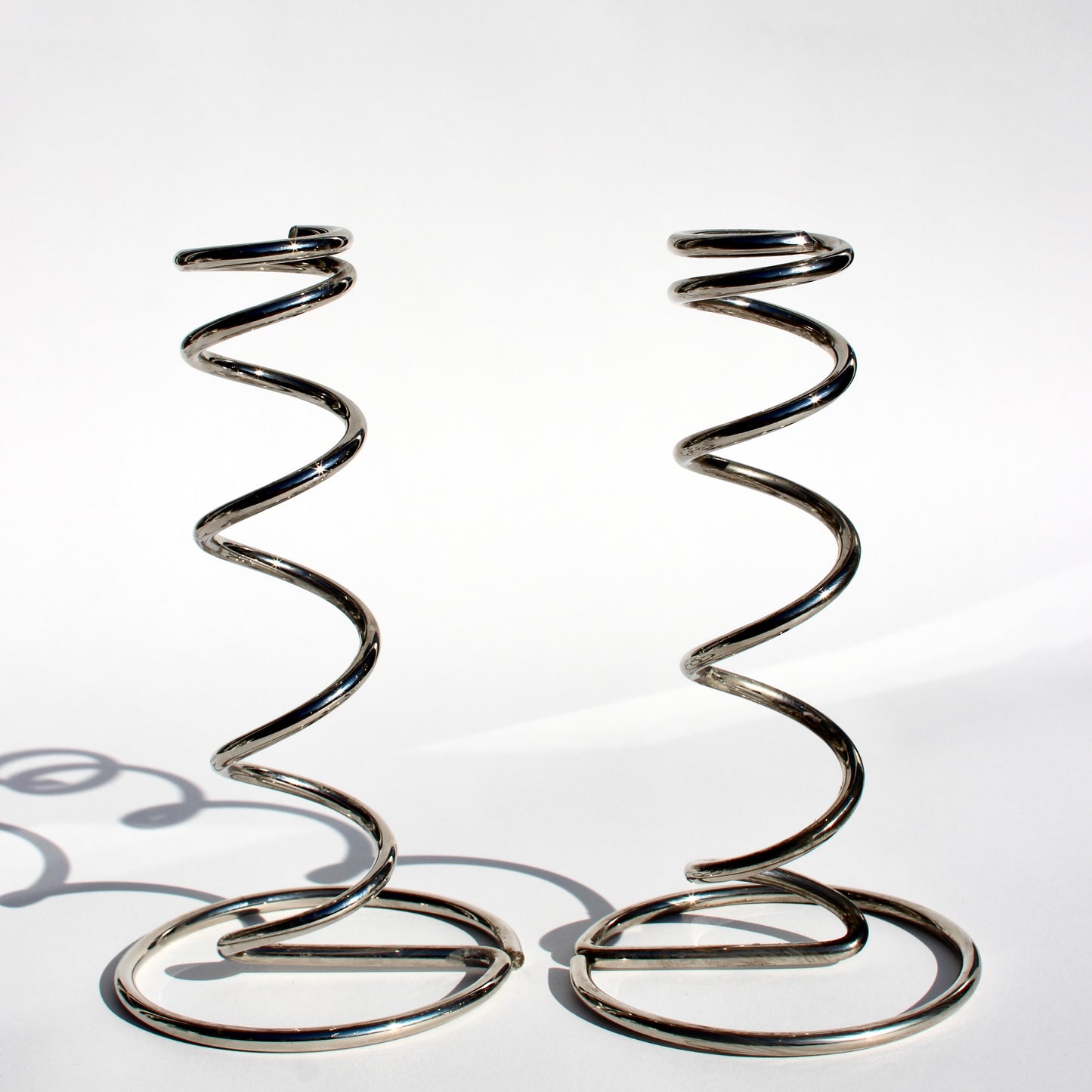 spiral chrome candlestick holders
