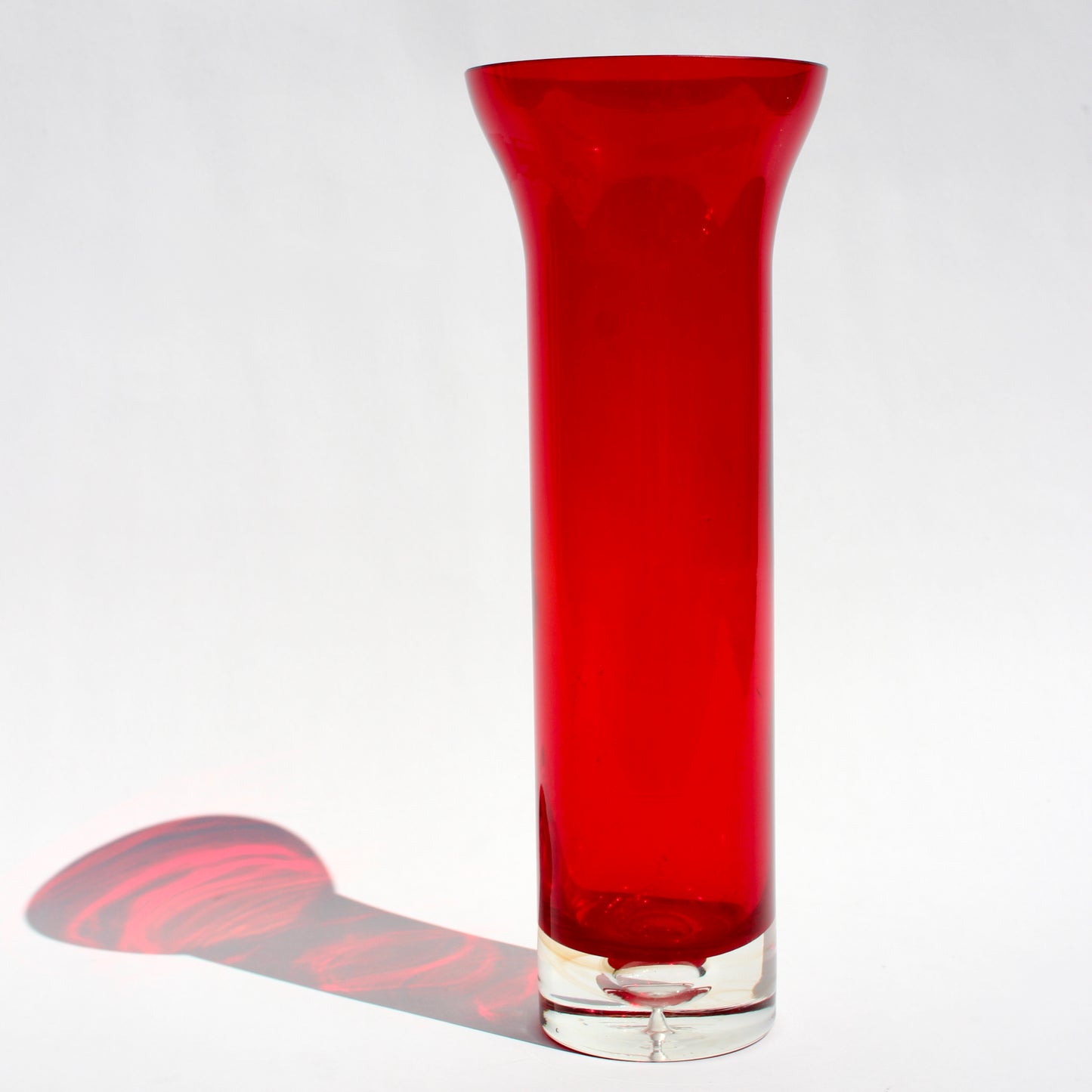 tall red glass vase