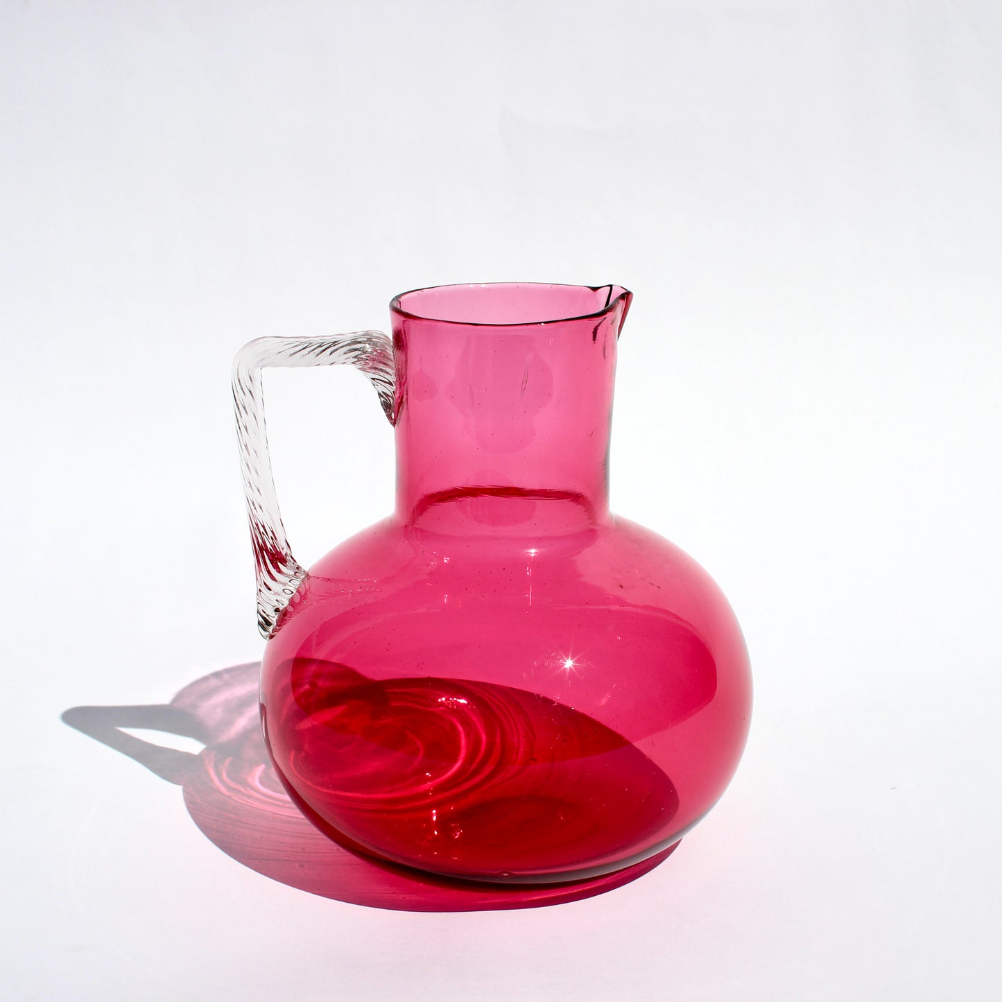handblown cranberry glass pitcher