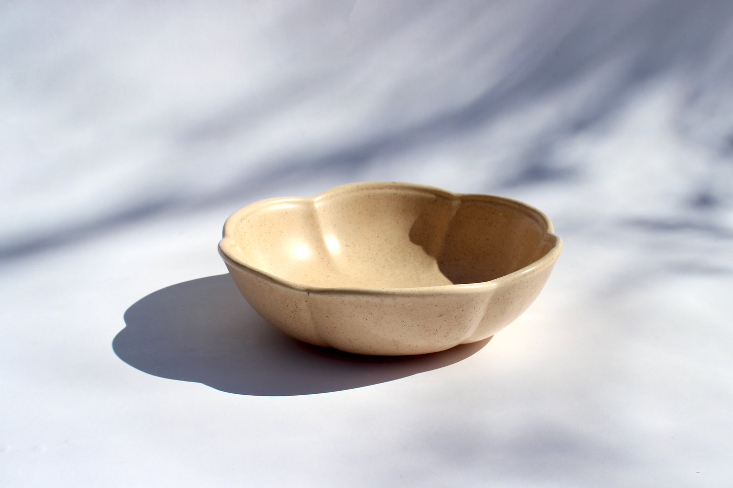 peach scalloped ceramic bowl