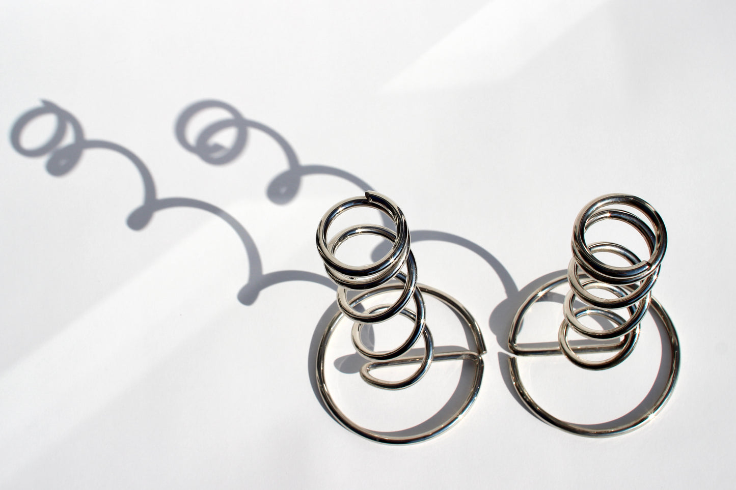 spiral chrome candlestick holders