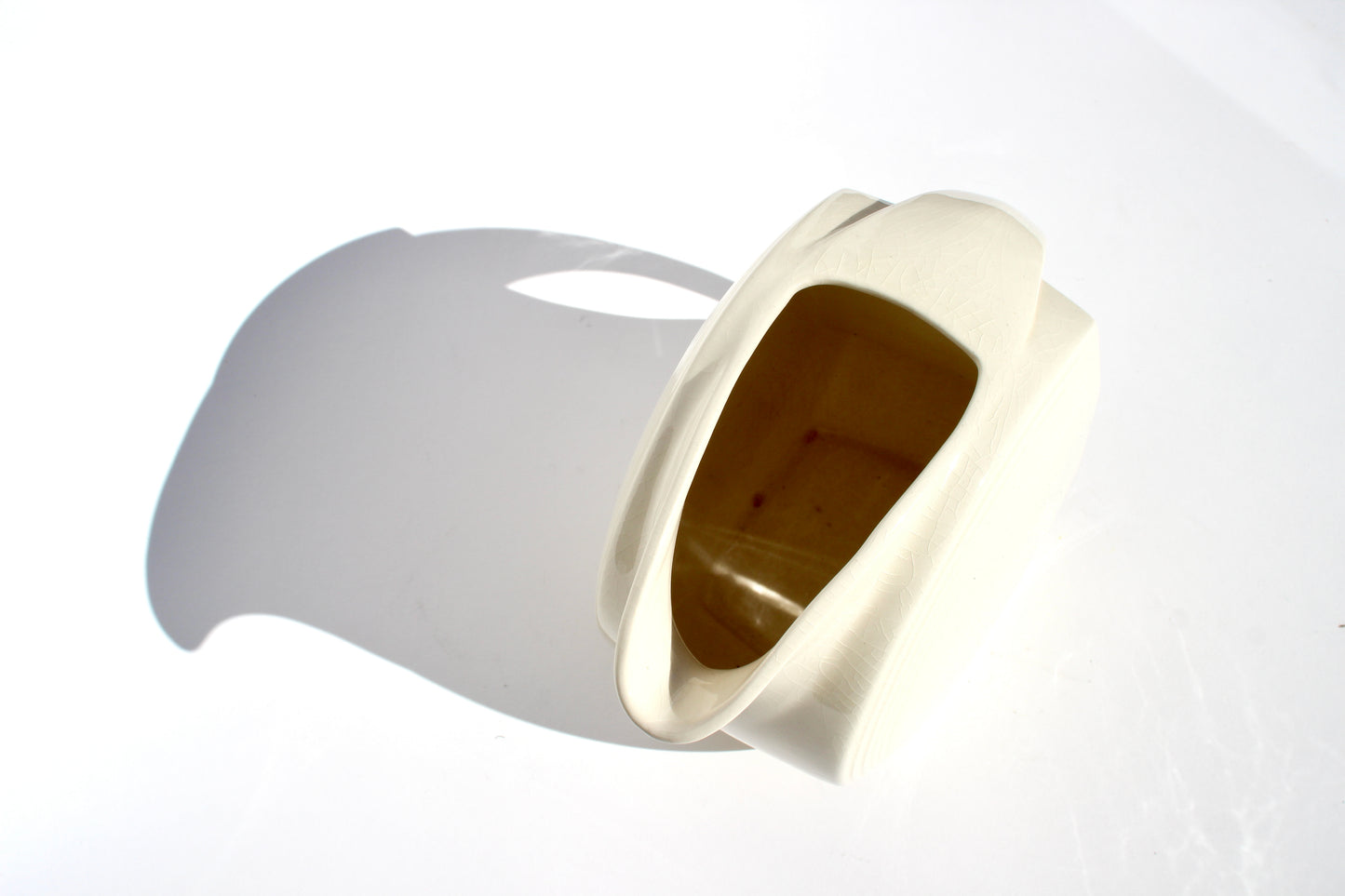 cream ceramic disc pitcher
